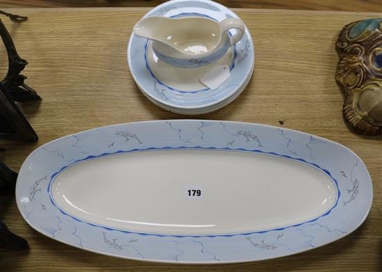 William P. Robins for Clarice Cliff. A dolphin designed Bizarre part dinner service longest 57.5cm